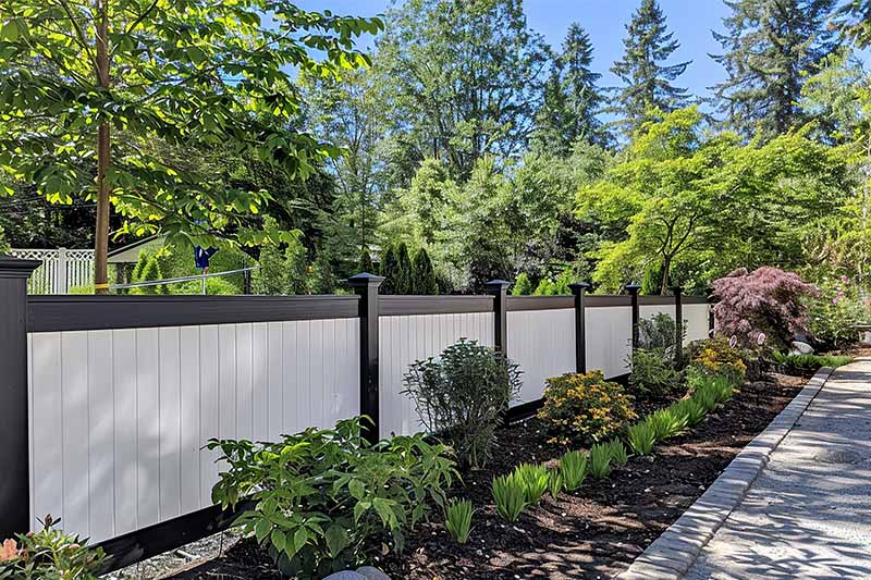 white vinyl fence black